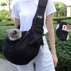 Natuya dog and cat sling carrier displayed for travel use