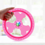 Side profile of pink Wandrola flying disc for dogs