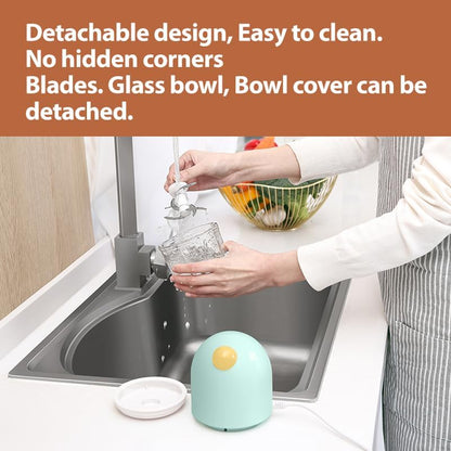 DAKONG infant food grinder with all detachable components separated including the lid and three hundred millilitre glass bowl for cleaning.