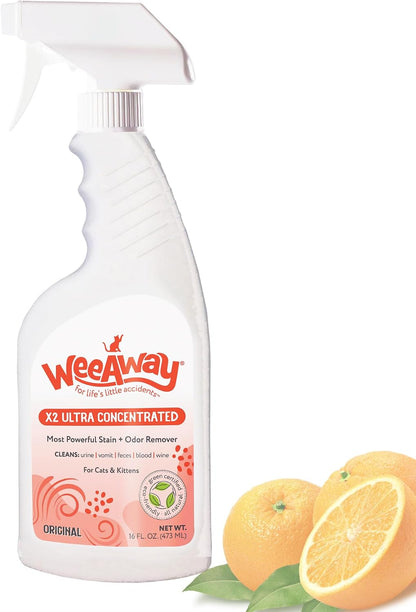 Applying Wee Away X2 bio enzymatic cleaner on bedroom mattress bedding