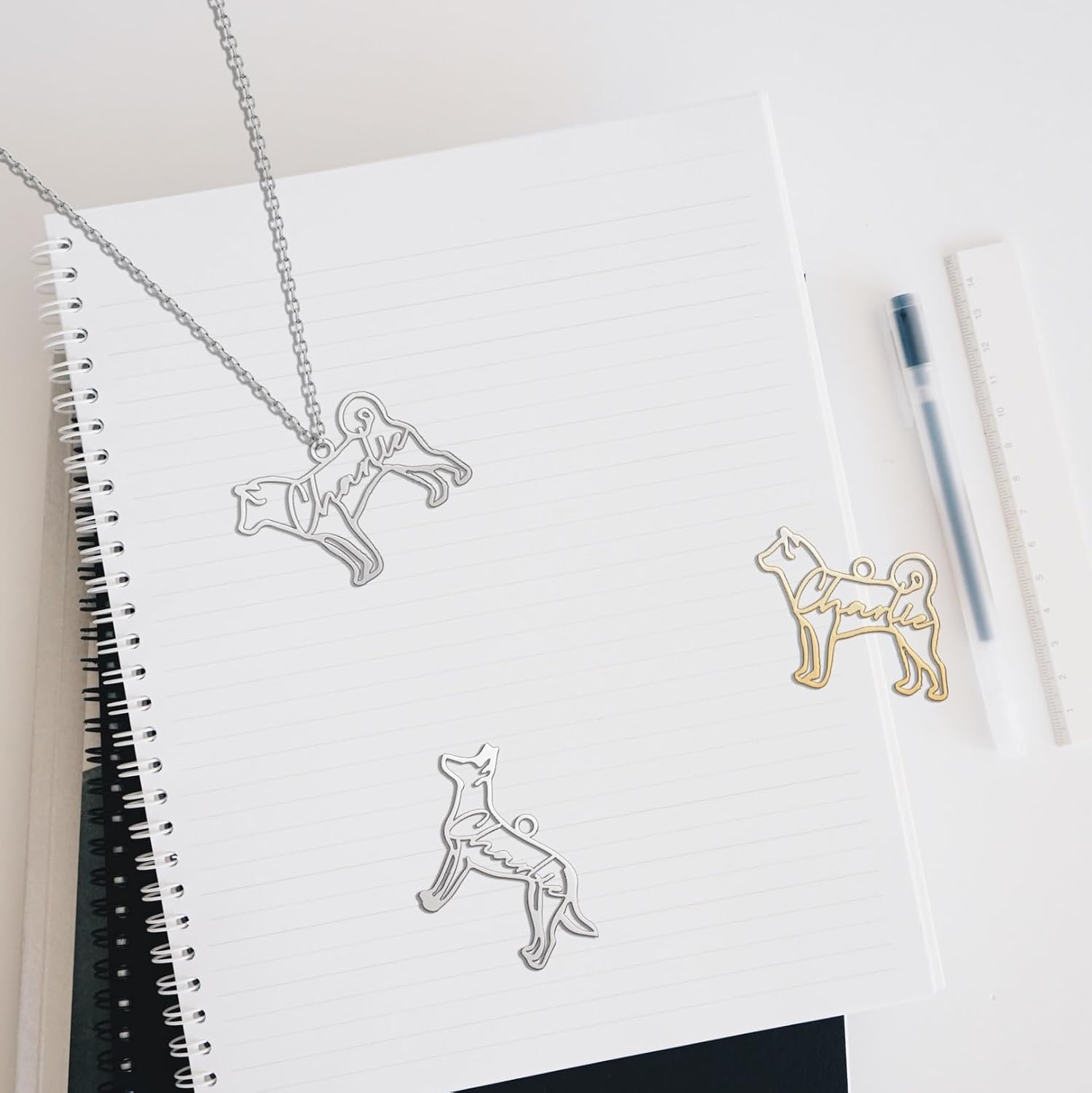 DemiJewelry custom dog pendant selection showing different dog breed options