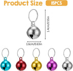 Close up of half inch mini dog collar jingle bells with heart shaped cutout details.