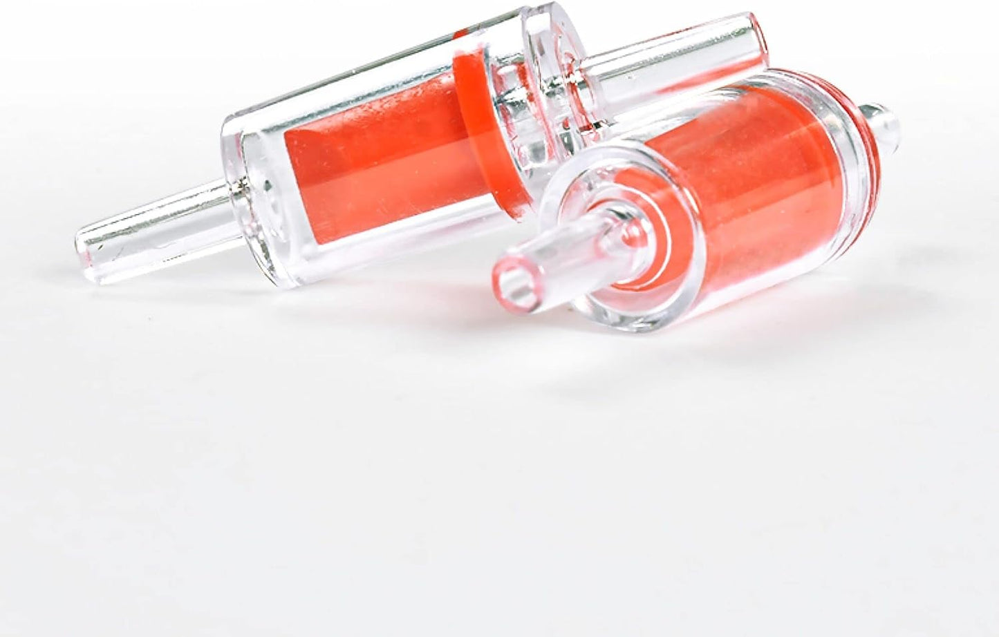 Safe backflow protection system featuring red plastic one-way check valves for fish tanks.