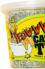 Close up view of loose leaf and flower top organic catnip texture inside the open container