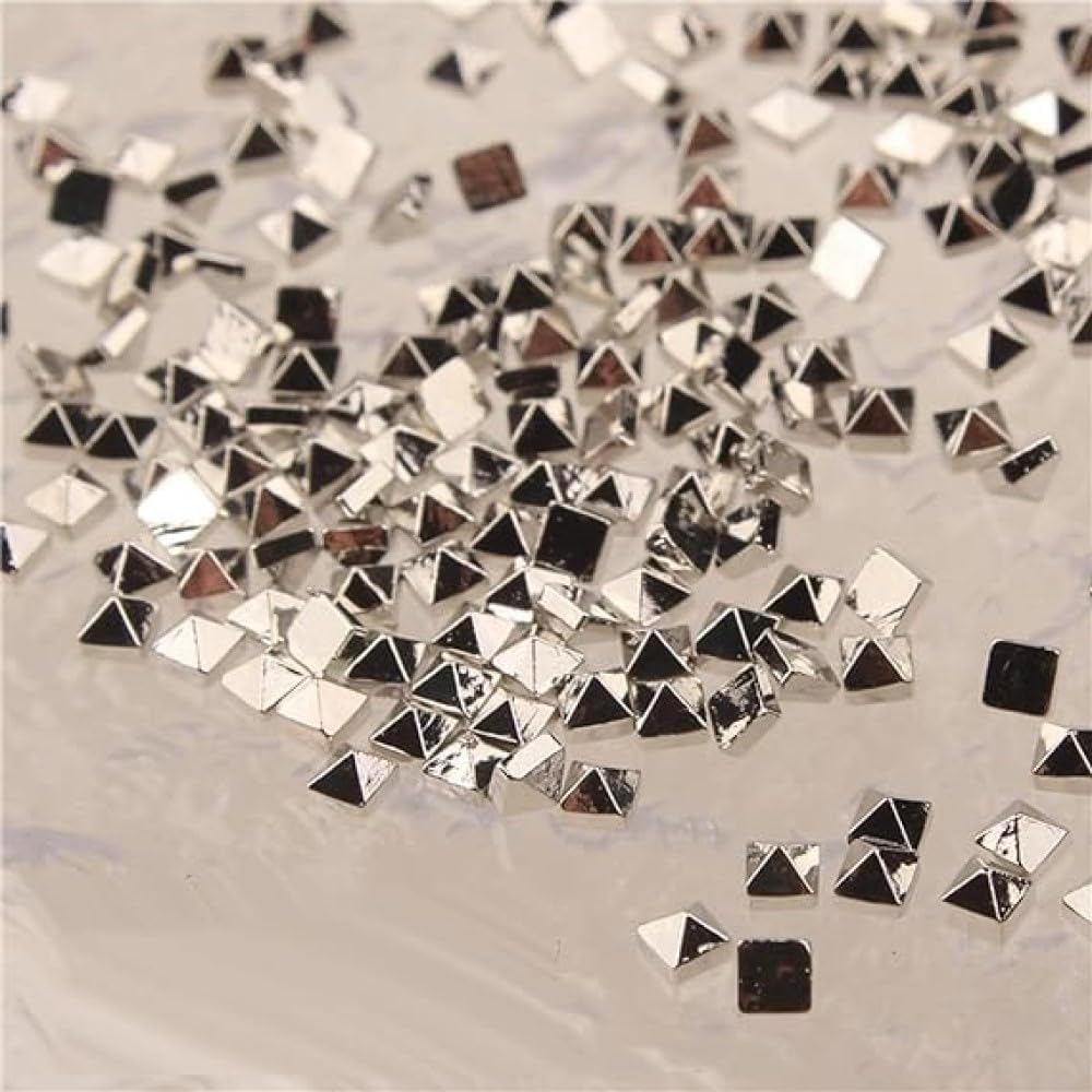 Chunmeng mini nail art studs front view showcasing three packs of silver pyramid rivets for manicures.