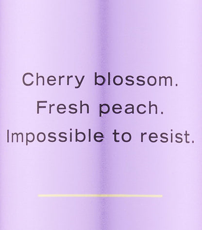 Victoria's Secret Love Spell refreshing body mist 250 ml packaging showing liquid detail.