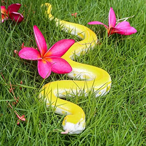 SIENON realistic snake toy rubber figurine coiled on a patio surface.