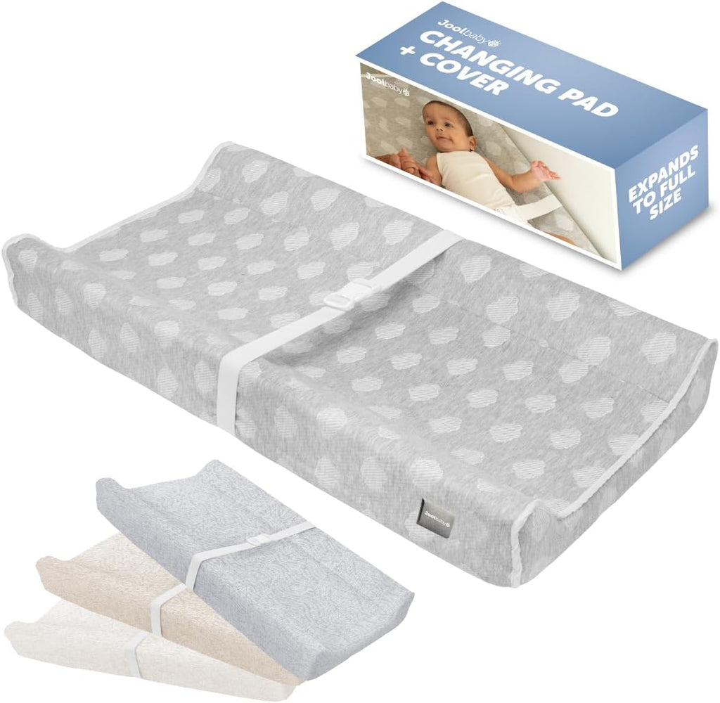 Jool Baby Serenity Soft Contoured Changing Pad front view with cloud pattern