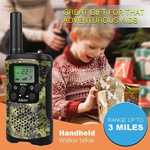 Aikmi camouflage walkie talkies showing the side push to talk button and battery compartment