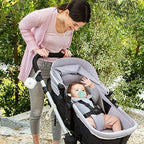 Munchkin UV-C cleaner placed inside a diaper bag for travel