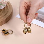 Styquenzer anti lost training pet bells showing the seventeen millimeter measurement details.