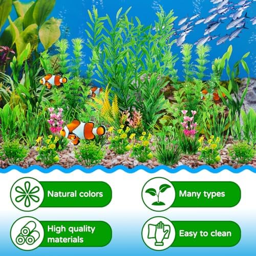 QUOZUO plastic aquarium plants placed inside a household office fish tank setup.