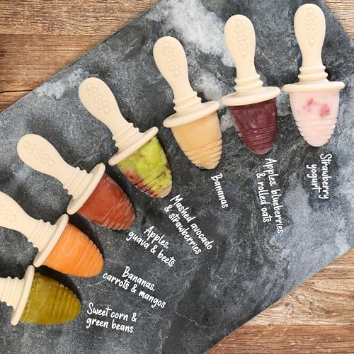 Pouring fresh organic fruit puree into the BPA-free PrimaStella silicone infant mold tray