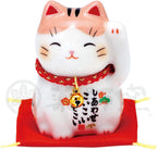 Yakushigama Lucky Cat Model 7533 Black resting on red cushion