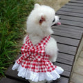XINGNIAO plaid pet dress harness front view on a small white dog