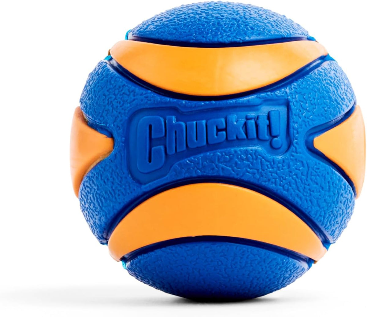 Dog holding Chuckit! Ultra Ball in mouth showing gentle design