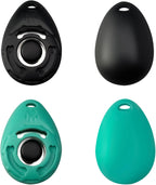 Black and green puppy clickers for positive reinforcement behavioral training sessions