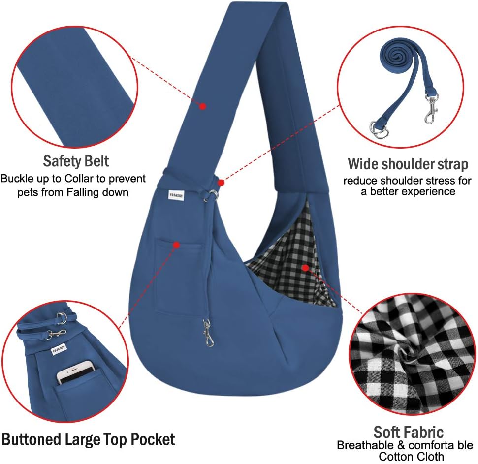 Small dog sitting comfortably inside blue fabric sling