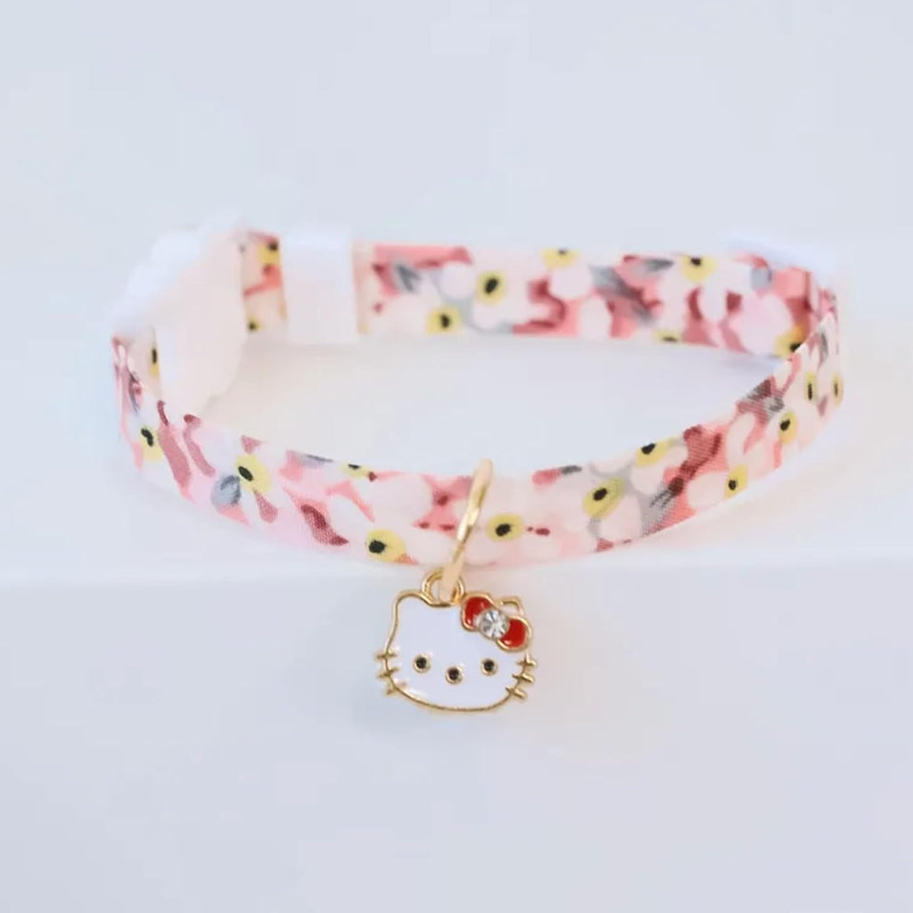 Two adjustable cat collars with safety breakaway buckles and bell attachments