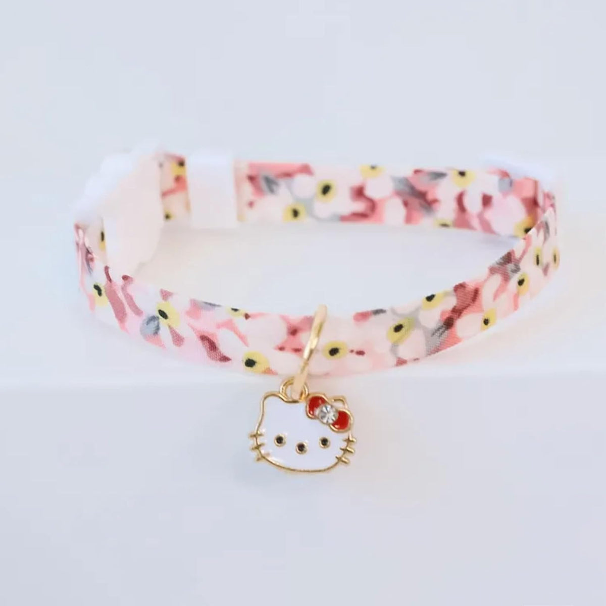 Two adjustable cat collars with safety breakaway buckles and bell attachments