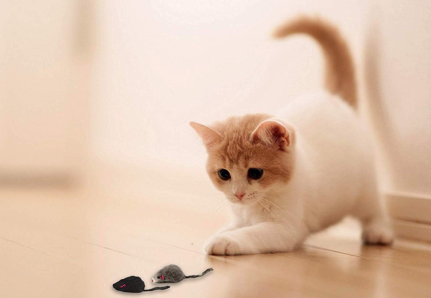 Close up view of the durable real fur hunting toy for indoor cats.