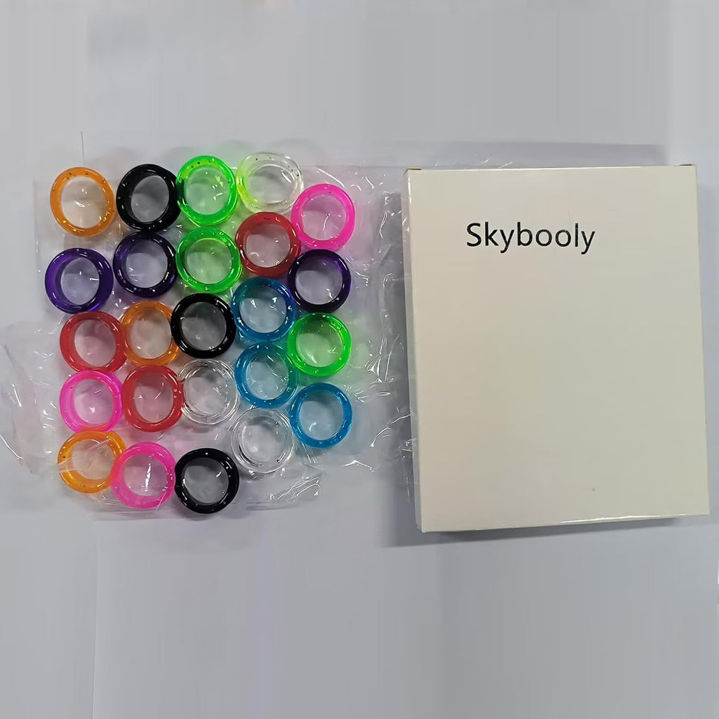 Side angle view of flexible pet grooming scissor finger hole reducers
