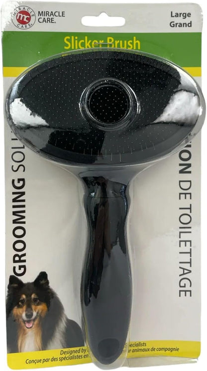 Miracle Care pet hair brush for shedding showing the black ergonomic cushioned handle.