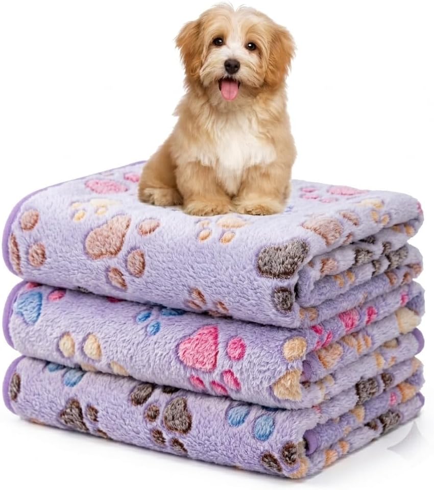Folded stack of three premium Yintrest fleece cat blankets showcasing high quality fabric textures.