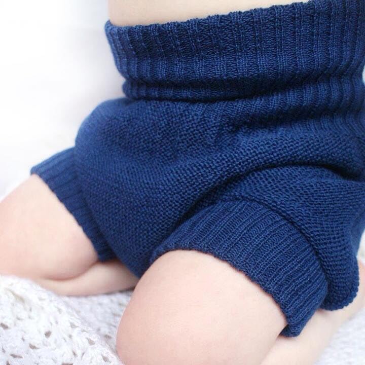 Ecoable wool cover worn over fitted cloth diaper