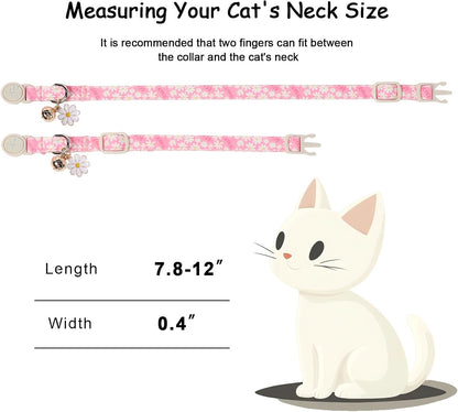 Babole Pet adjustable cat collar showing the removable metallic bell and daisy flower pendant detailing.