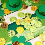 Vicroic green and gold four leaf clover coins used as festive table scatter decorations for a holiday party layout