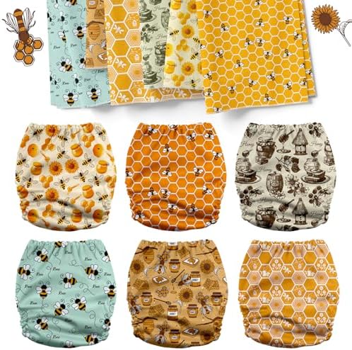 Mama Koala cloth diapers showing absorbent natural inserts and pocket opening