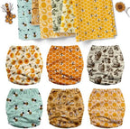 Mama Koala cloth diapers showing absorbent natural inserts and pocket opening
