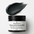 Peakright Charcoal and Neem Balm front view jar for skin detoxification.