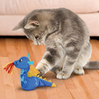 Close up view of the premium catnip infused dragon plush toy highlighting the yarn flames and textured tail.