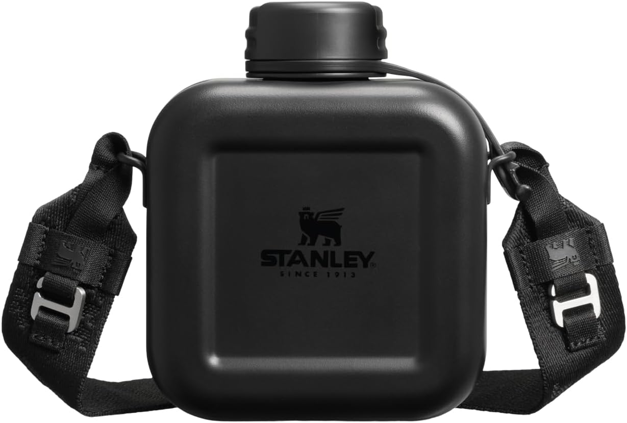 Detailed shot of the adjustable carry strap connection hardware on the bottle.