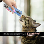 Cat eating Fussie Cat puree from a bowl