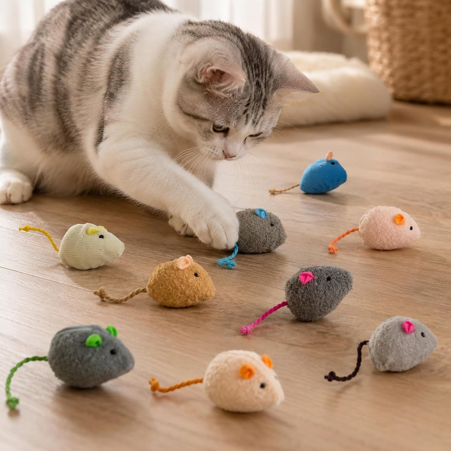 Different angles of the durable cat teaser mouse toy highlighting the pet safe fabric.
