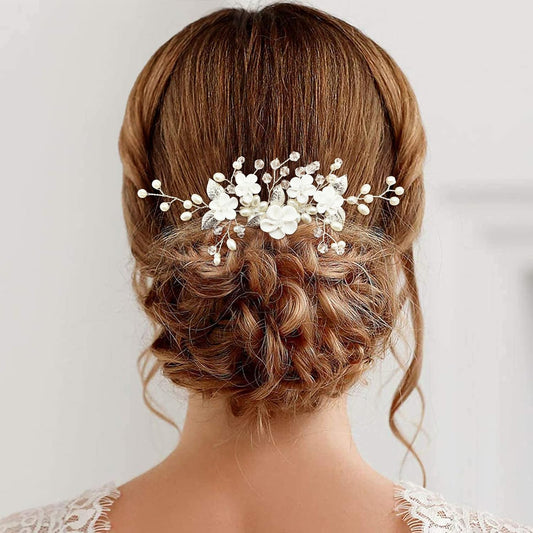 PrettyLife flower bridal hair vine front view showing white clay flowers and pearls.