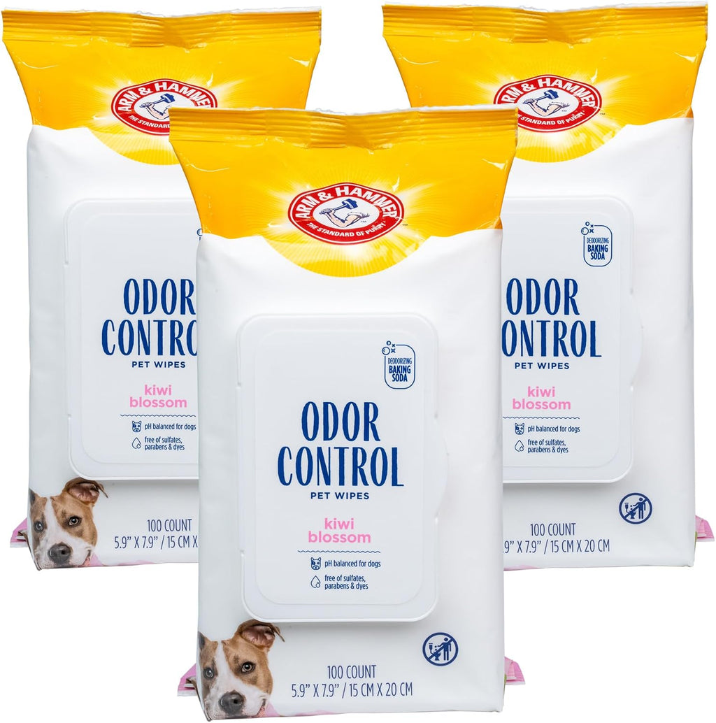 Pet safe deodorizing wipes being pulled from the pop up dispenser lid