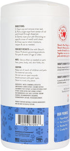 Plant-based biodegradable pet wipes for dogs and cats being pulled from the dispenser container.