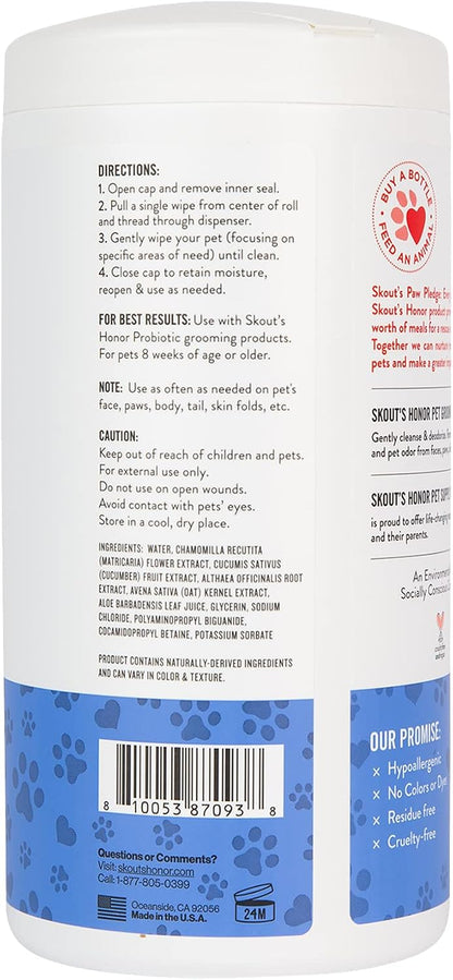 Plant-based biodegradable pet wipes for dogs and cats being pulled from the dispenser container.