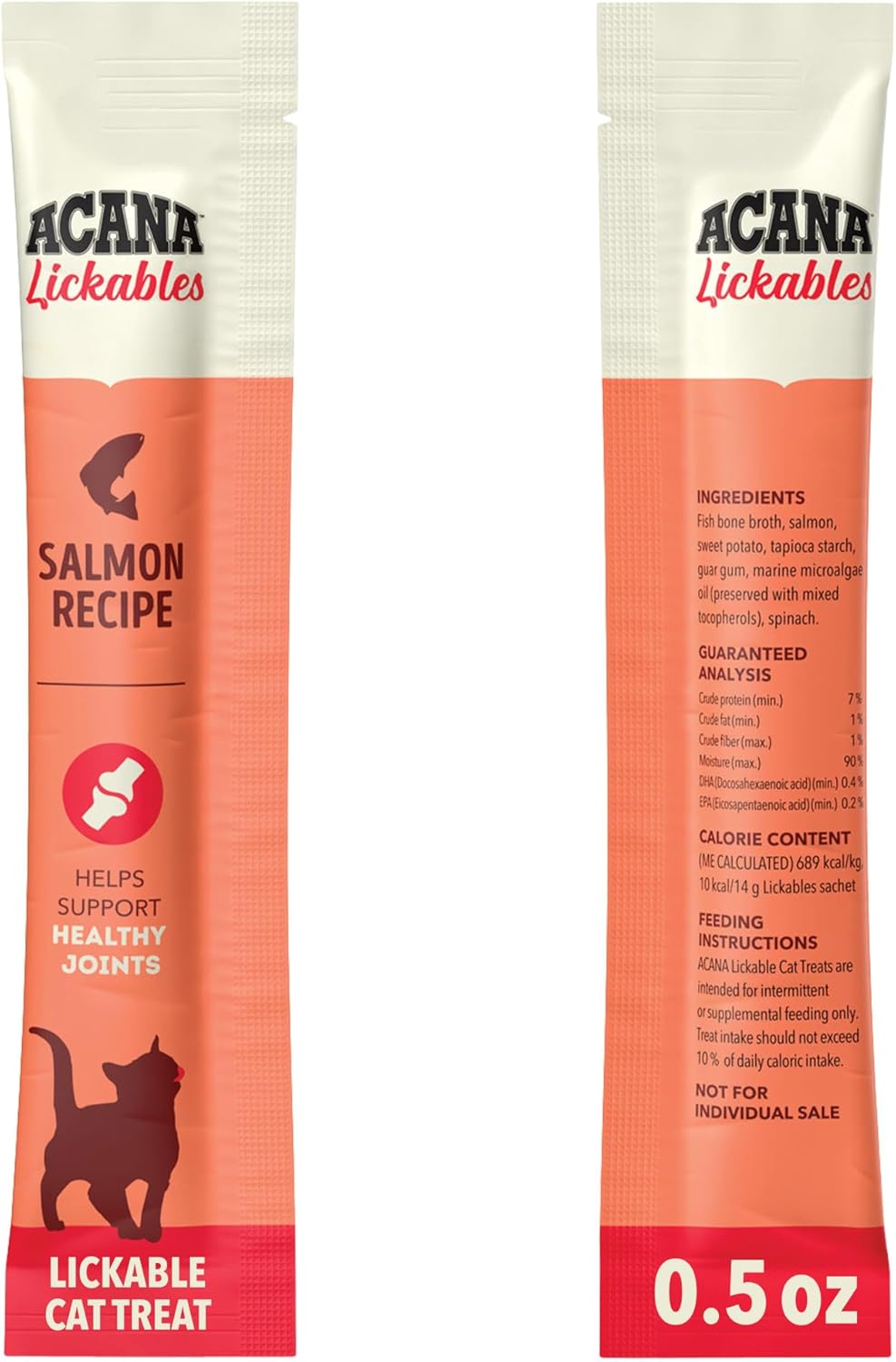 ACANA Lickables salmon purÃ©e treat being hand fed to a cat