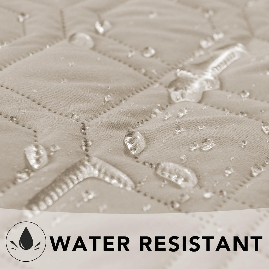 Ameritex pet blanket spread across a large bedroom mattress demonstrating full coverage protection.