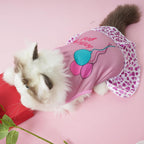 Size medium authentic imported pet apparel laid flat to show chest dimensions.