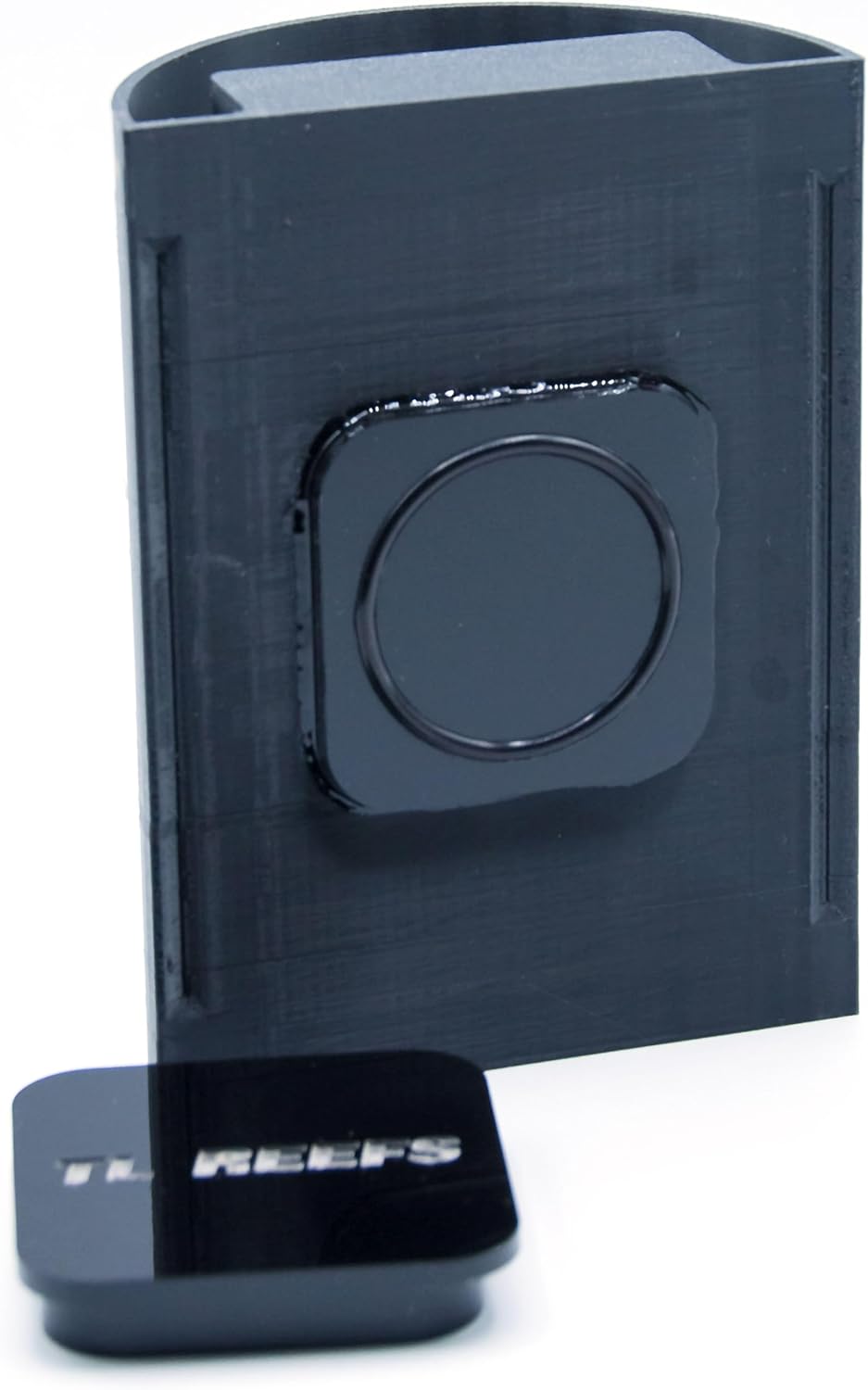 Close-up of the acrylic encased magnet on the back of the black TL Reefs seaweed grazing tool.