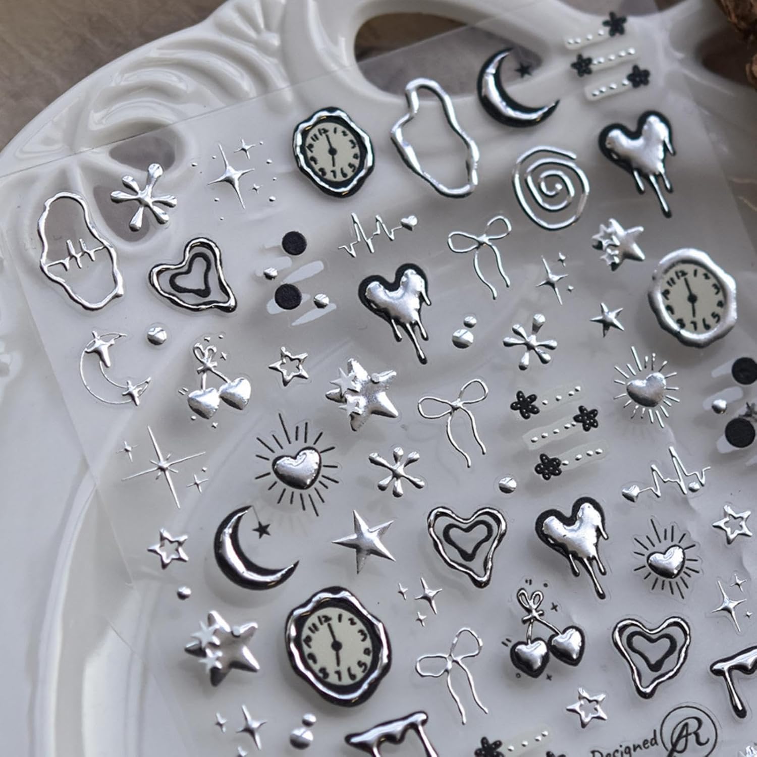 NBNTGH silver nail art stickers featuring heart and star designs