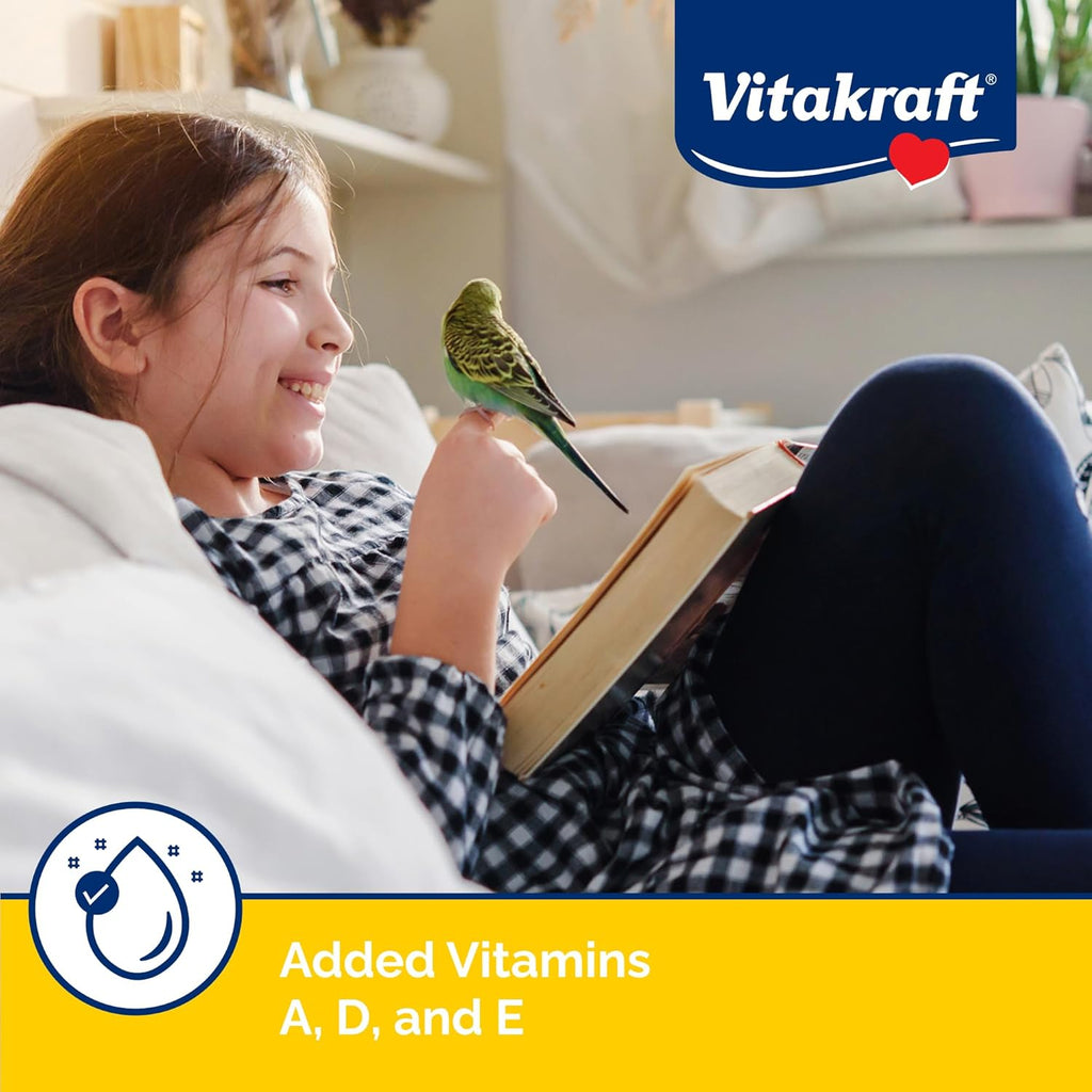 Parakeet eating Vitakraft VitaSmart egg food supplement