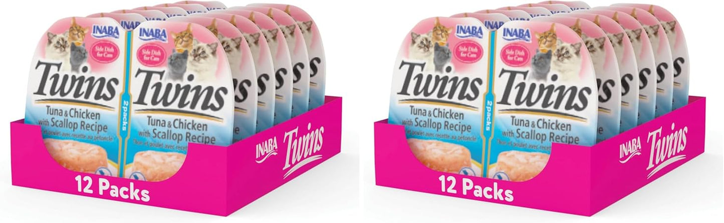 Cat enjoying Inaba Twins meal topper on dry kibble