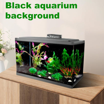 Aquascaped fish tank with a COCODE black backdrop hiding wires and highlighting colorful fish.